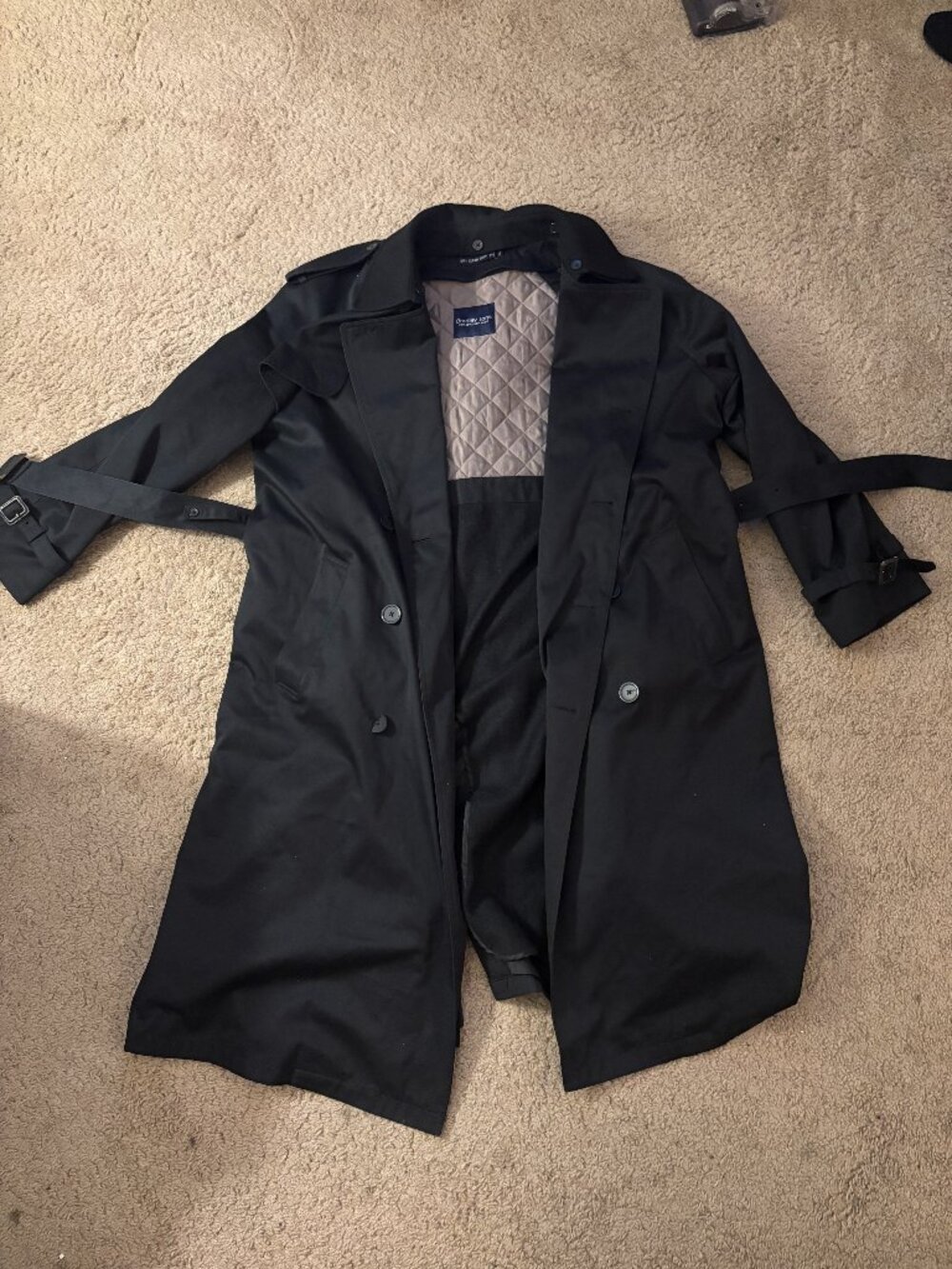 Bradley Jons black trench coat